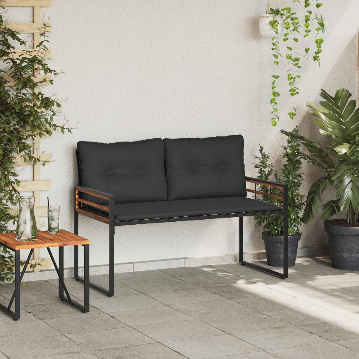 Runde – Lage tuinbank van acaciahout en staal